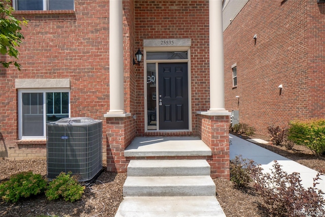 25549 Grandview Ln Unit 31, Novi, MI 48375 - view of exterior entry featuring brick siding