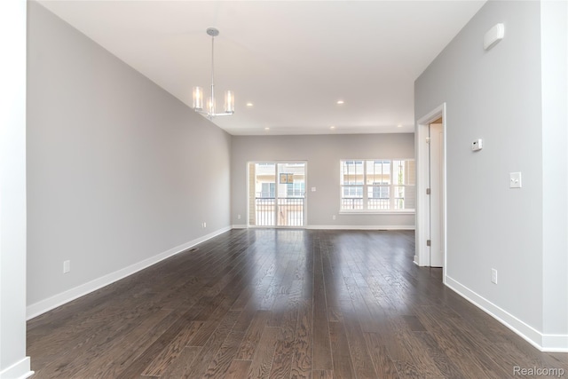 25549 Grandview Ln Unit 31, Novi, MI 48375 - unfurnished room featuring dark wood-style floors, a chandelier, and recessed lighting