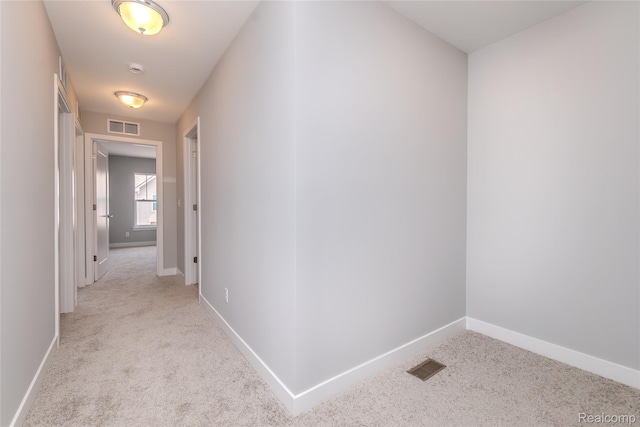 25549 Grandview Ln Unit 31, Novi, MI 48375 - corridor with light carpet and baseboards