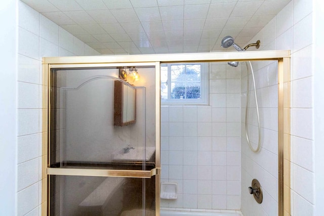 full bathroom with an enclosed shower