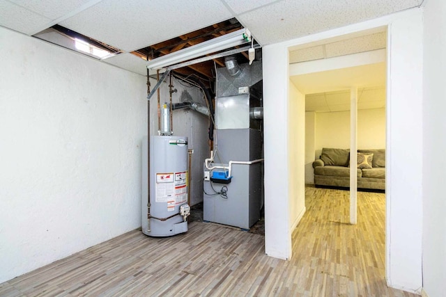 utilities featuring gas water heater and heating unit