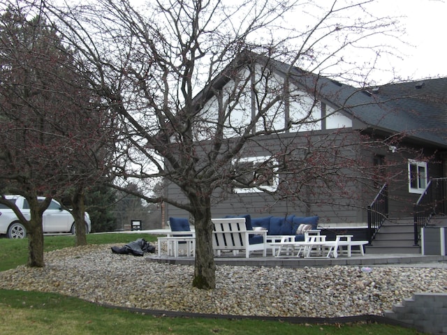 exterior space with an outdoor living space