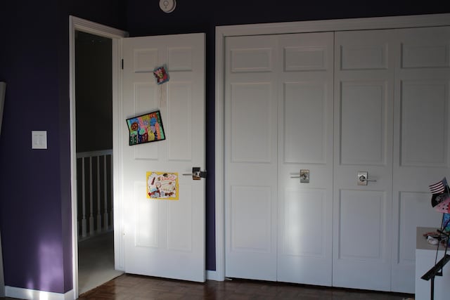 unfurnished bedroom featuring a closet