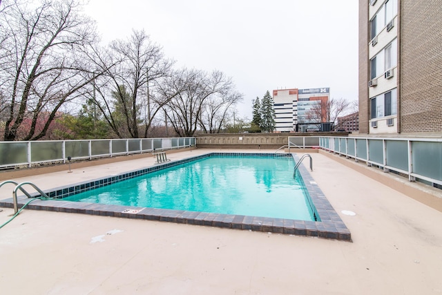 1050 Wall St Unit 3C, Ann Arbor, MI 48105 - community pool with fence and a patio area