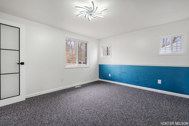 175 Cora Ave, Muskegon, MI 49445 - carpeted spare room with baseboards