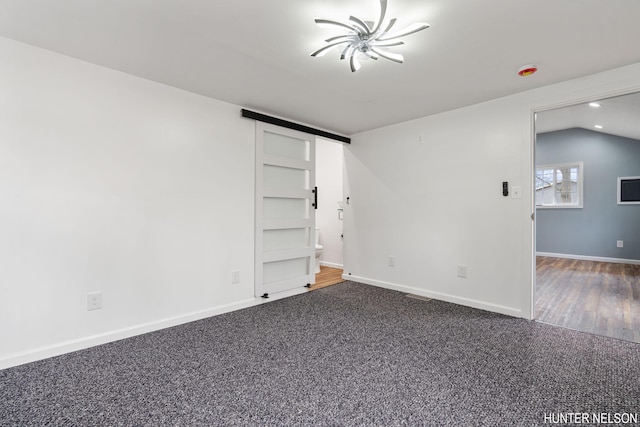 175 Cora Ave, Muskegon, MI 49445 - empty room featuring baseboards, recessed lighting, and dark colored carpet