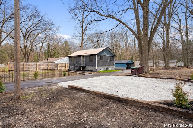 175 Cora Ave, Muskegon, MI 49445 - exterior space with fence and driveway