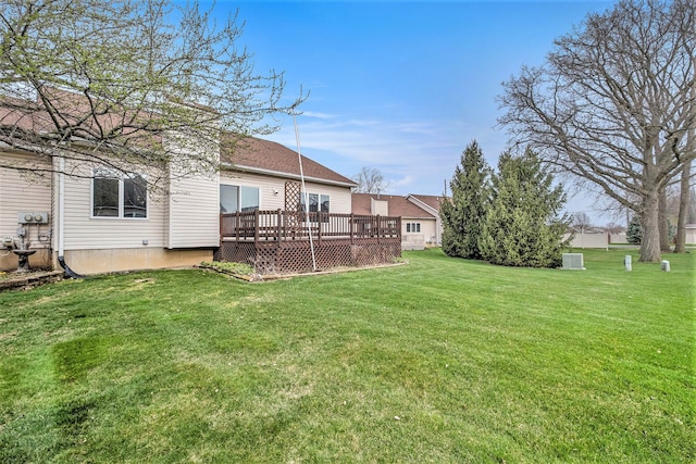 view of yard featuring a wooden deck