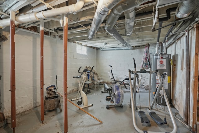 exercise room featuring gas water heater