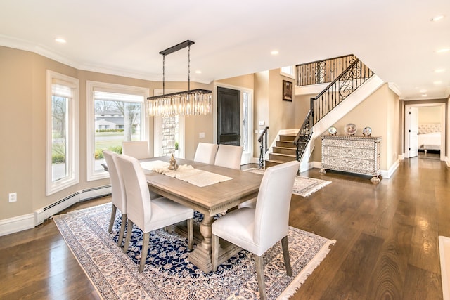 dining room featuring a baseboard heating unit, a notable chandelier, crown molding, stairs, and dark wood finished floors
