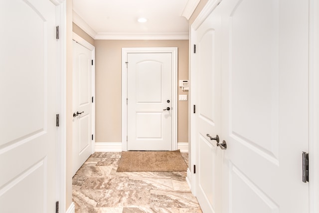 doorway with crown molding, recessed lighting, marble finish floor, and baseboards