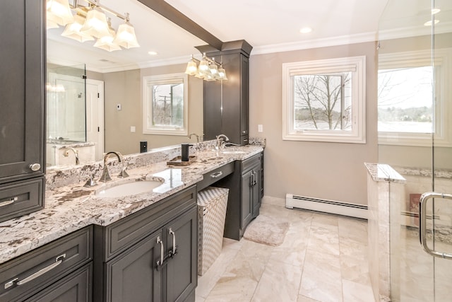 full bathroom with crown molding, a notable chandelier, marble finish floor, and a sink