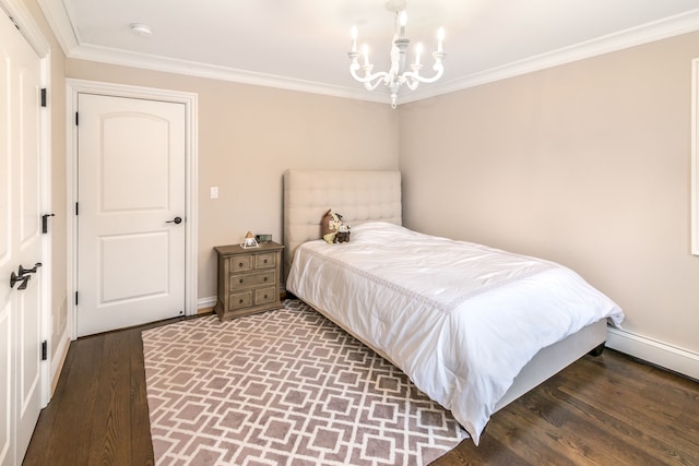 bedroom with ornamental molding, an inviting chandelier, wood finished floors, and baseboards