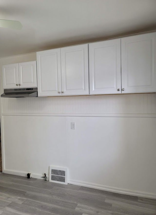 18639 Appoline St, Detroit, MI 48235 - washroom with gas dryer hookup, wood finished floors, and baseboards