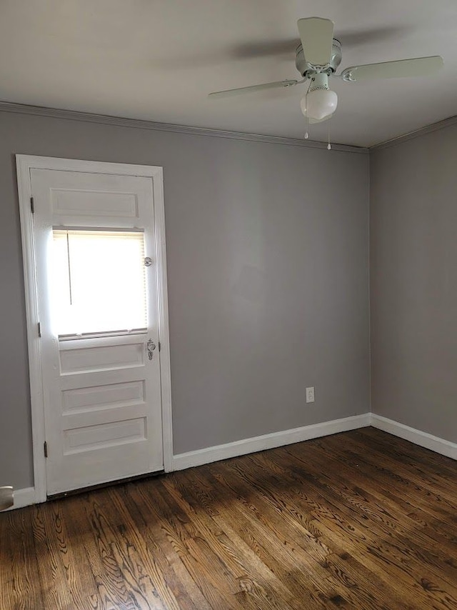 18639 Appoline St, Detroit, MI 48235 - empty room featuring ornamental molding, ceiling fan, dark wood-style floors, and baseboards