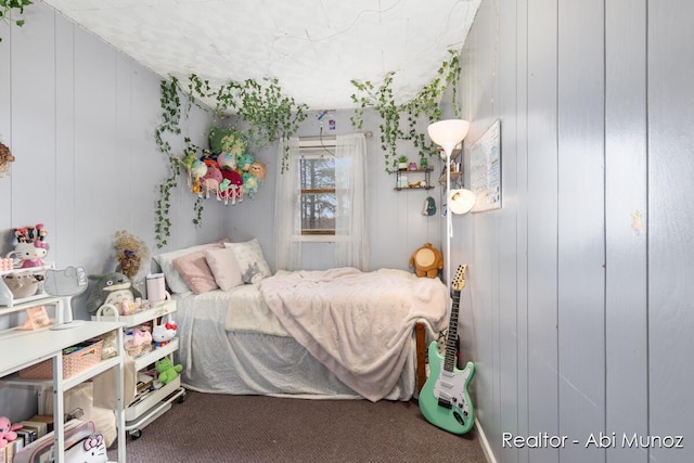 bedroom featuring carpet