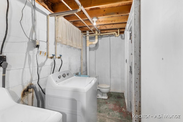 laundry area featuring laundry area and washing machine and clothes dryer