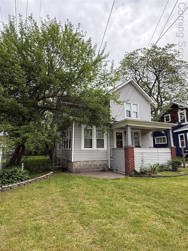 35 Grove Park St, Mount Clemens, MI 48043 - view of front of home with a front yard