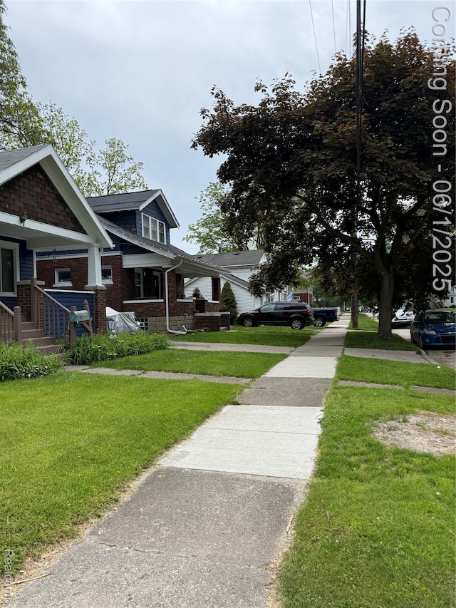 35 Grove Park St, Mount Clemens, MI 48043 - view of property's community with a yard