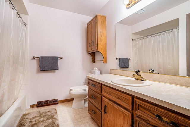 bathroom with toilet, tile patterned floors, vanity, and visible vents