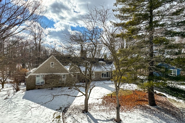 4717 Mohican Ln, Okemos, MI 48864 - view of front of home with a chimney
