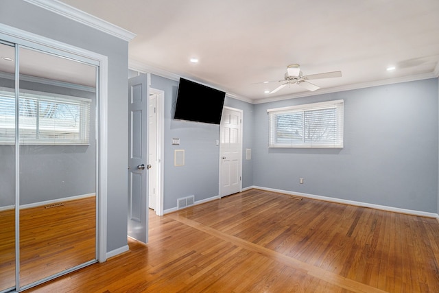 interior space featuring baseboards, visible vents, and plenty of natural light