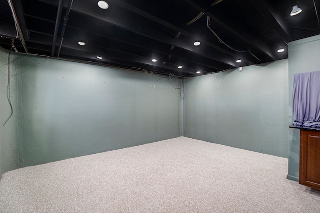 finished below grade area featuring carpet flooring