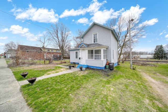 exterior space with a front lawn