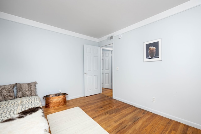 1209 Island Dr Unit 102, Ann Arbor, MI 48105 - living area with wood finished floors and baseboards