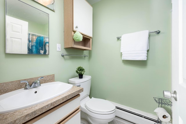 1209 Island Dr Unit 102, Ann Arbor, MI 48105 - full bathroom with a baseboard heating unit, toilet, and vanity