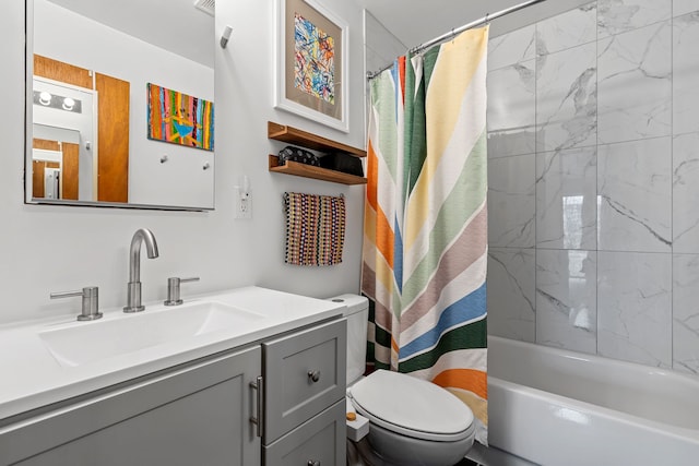 bathroom with toilet, shower / bathtub combination with curtain, and vanity