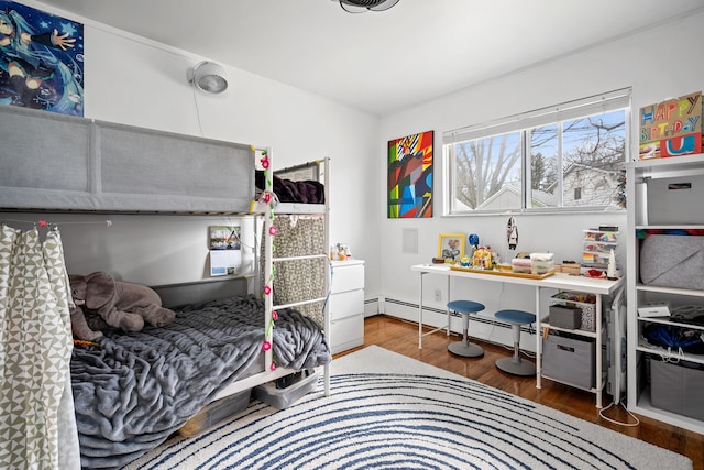 bedroom featuring wood finished floors