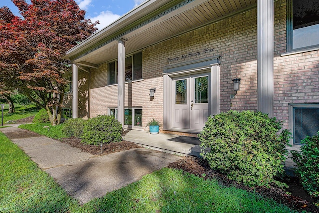2693 Laurentide Dr, Ann Arbor, MI 48103 - property entrance featuring brick siding and a porch
