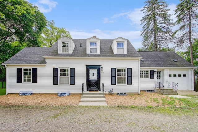 2690 Overridge Dr, Ann Arbor, MI 48104 - new england style home featuring a garage and a shingled roof