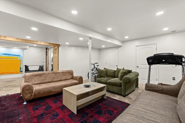 living area featuring marble finish floor, visible vents, and recessed lighting
