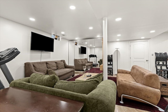 living room with recessed lighting and visible vents