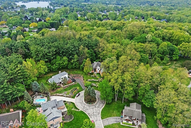 5721 Coralwood Ct, Commerce Twp, MI 48382 - view of property location featuring a heavily wooded area