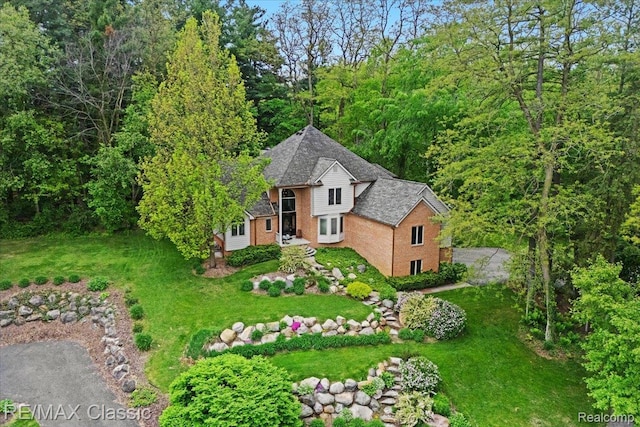 5721 Coralwood Ct, Commerce Twp, MI 48382 - aerial view of property and surrounding area featuring a heavily wooded area