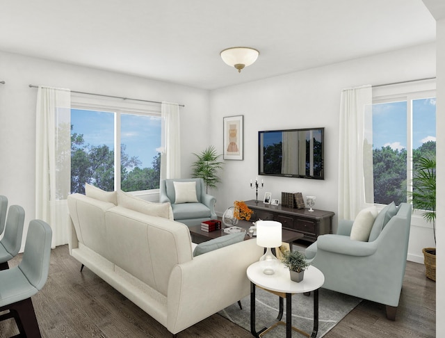 living room with a wealth of natural light and wood finished floors