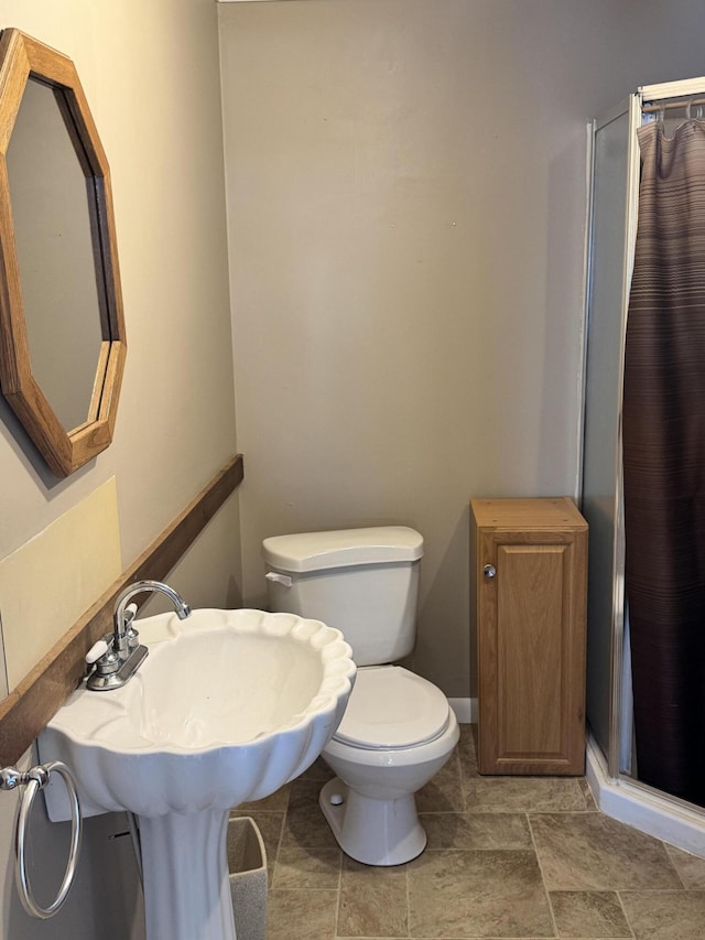 170 Tuttle Park Dr, Sherwood, MI 49089 - bathroom with a shower stall and toilet