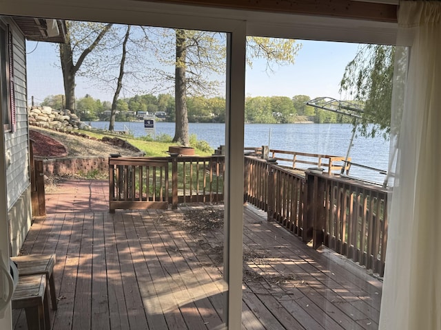 170 Tuttle Park Dr, Sherwood, MI 49089 - wooden terrace with a water view