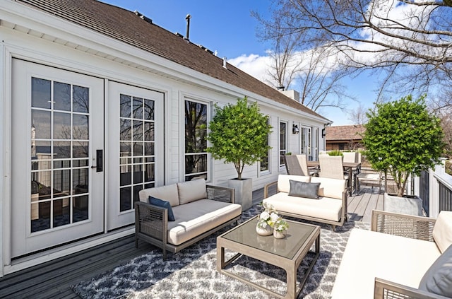 6376 Sterling Dr, Newport, MI 48166 - wooden terrace featuring french doors, outdoor dining space, and an outdoor hangout area