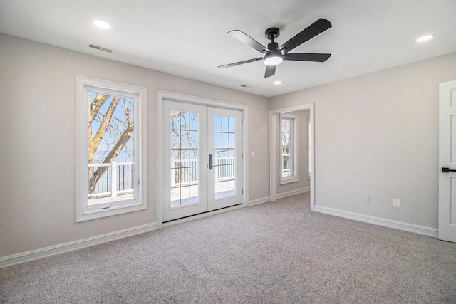 6376 Sterling Dr, Newport, MI 48166 - spare room with plenty of natural light, carpet flooring, and french doors