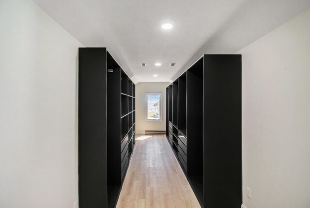 6376 Sterling Dr, Newport, MI 48166 - spacious closet with light wood finished floors and visible vents