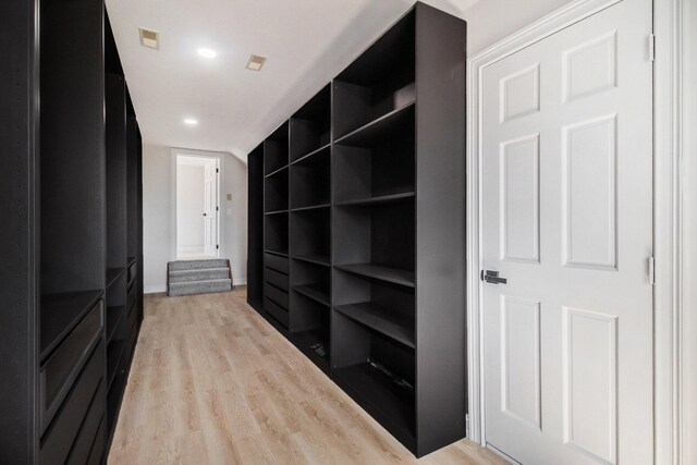 6376 Sterling Dr, Newport, MI 48166 - spacious closet featuring light wood-style floors and visible vents