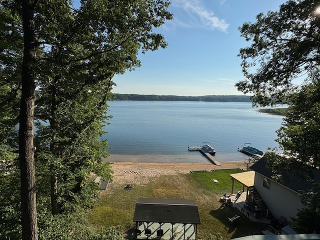 7075 N Poplar Rd, Michigan, MI 49411 - water view with a dock
