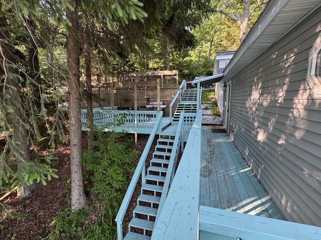 7075 N Poplar Rd, Michigan, MI 49411 - wooden deck with stairs