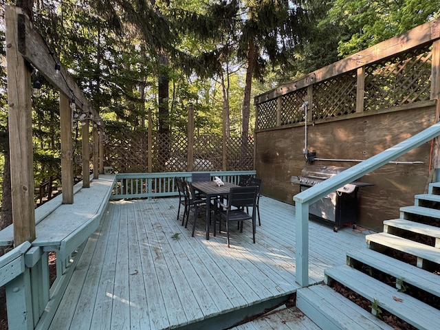 7075 N Poplar Rd, Michigan, MI 49411 - deck featuring outdoor dining space