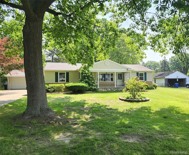 1260 Hira St, Waterford, MI 48328 - ranch-style home with a porch, a front lawn, and a garage