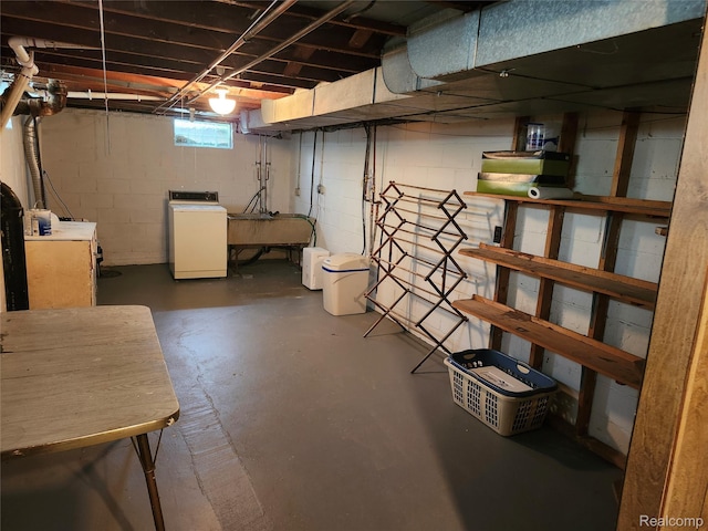 1260 Hira St, Waterford, MI 48328 - basement with washer and dryer and a sink